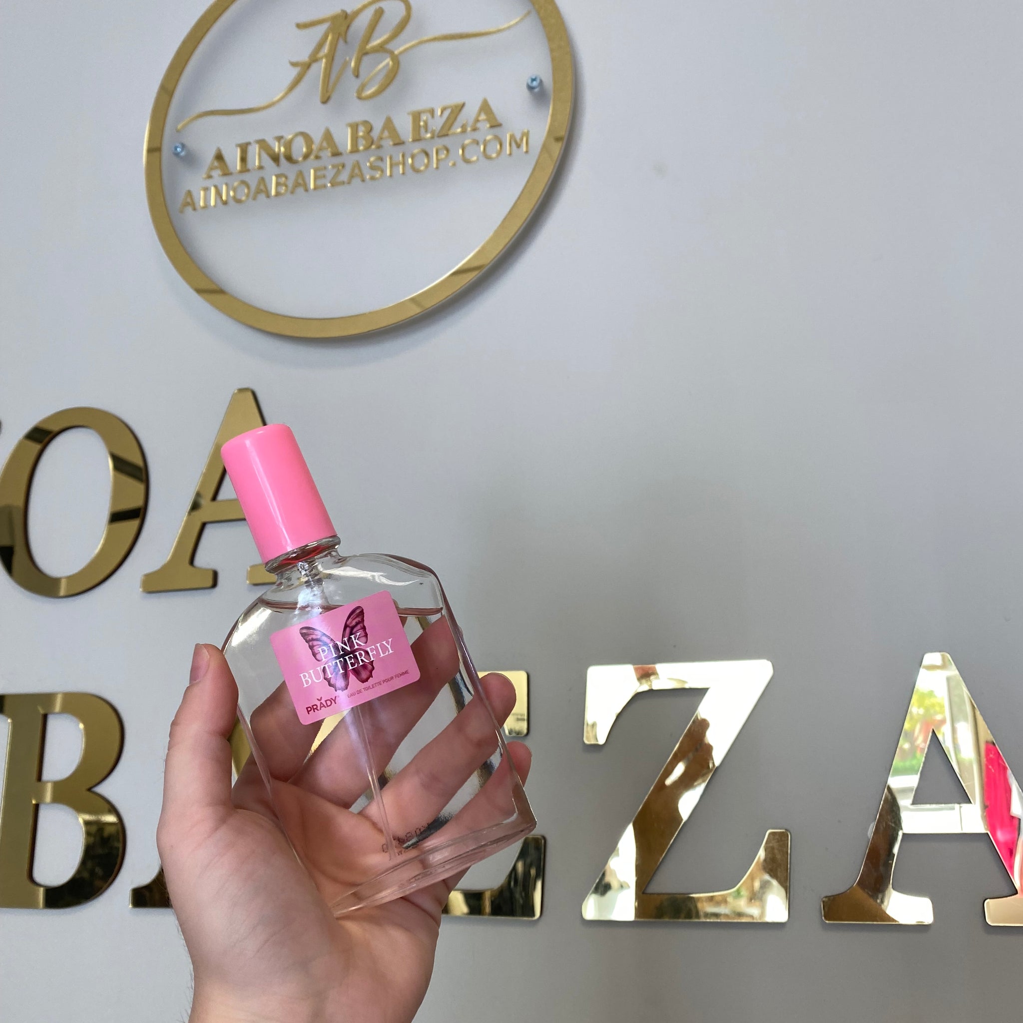Perfume mariposa rosa